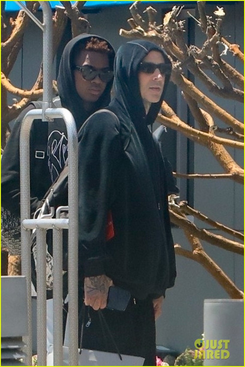 Kourtney Kardashian & Travis Barker Return Home to L.A. After Wedding in Italy