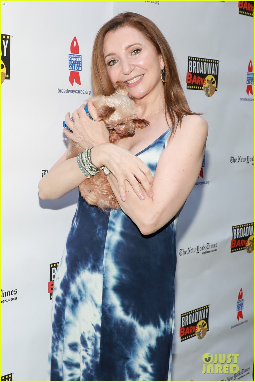 Hugh Jackman & Sutton Foster Cuddle with Puppies at Broadway Barks 2022 in NYC