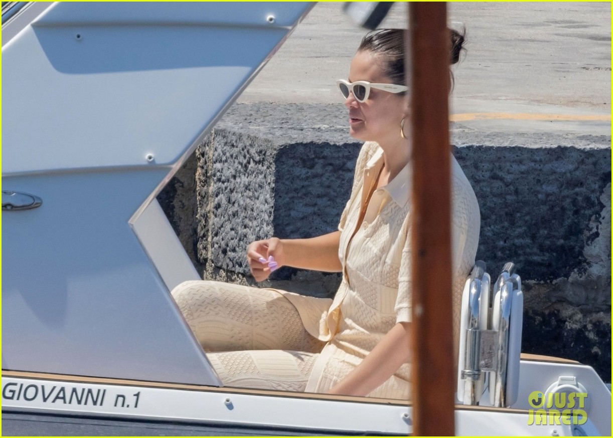 Selena Gomez Gets Help From Producer Andrea Iervolino While Boarding Yacht in Italy