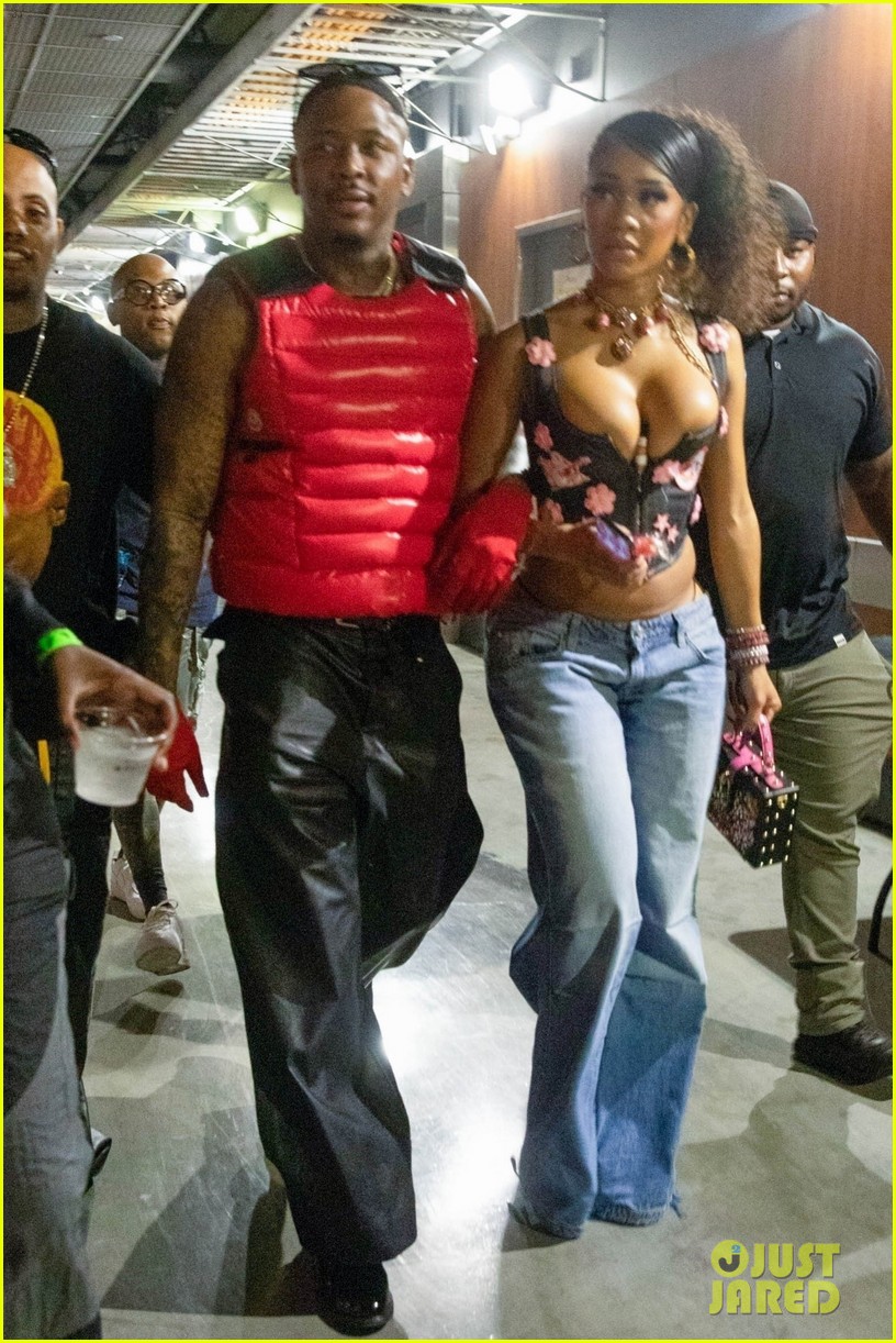 Saweetie & YG Head to 50 Cent's Concert Arm in Arm