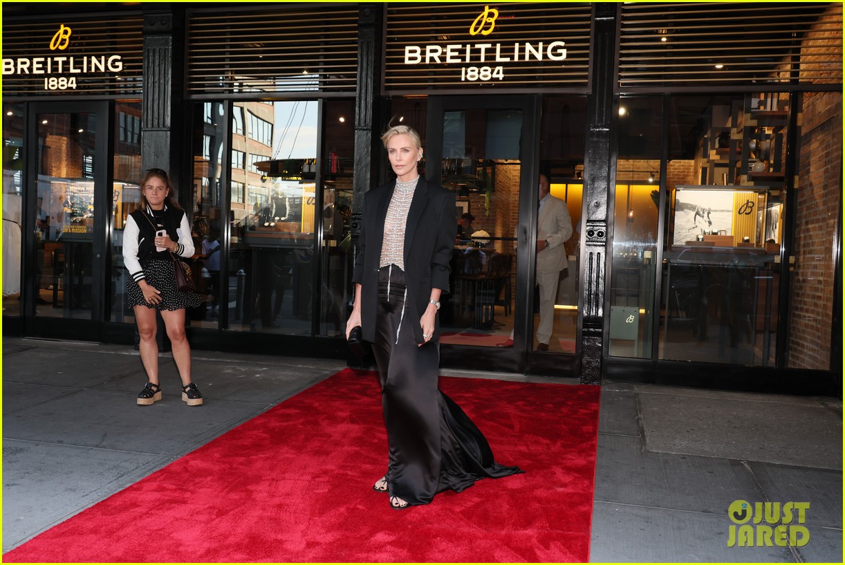 Charlize Theron Wears A Daring Pearl Top For Breitling's Boutique Opening in NYC