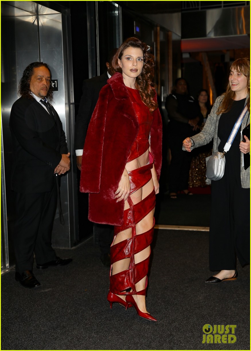 Julia Fox Wraps Herself in a Revealing Red Dress, Rocks Thigh-High Lace-Up Boots
