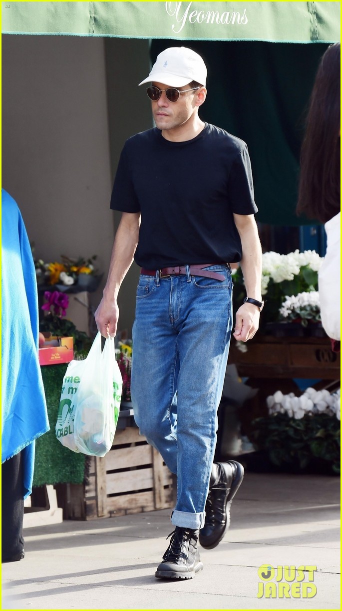 Rami Malek & Emma Corrin Hold Hands on Shopping Date in London