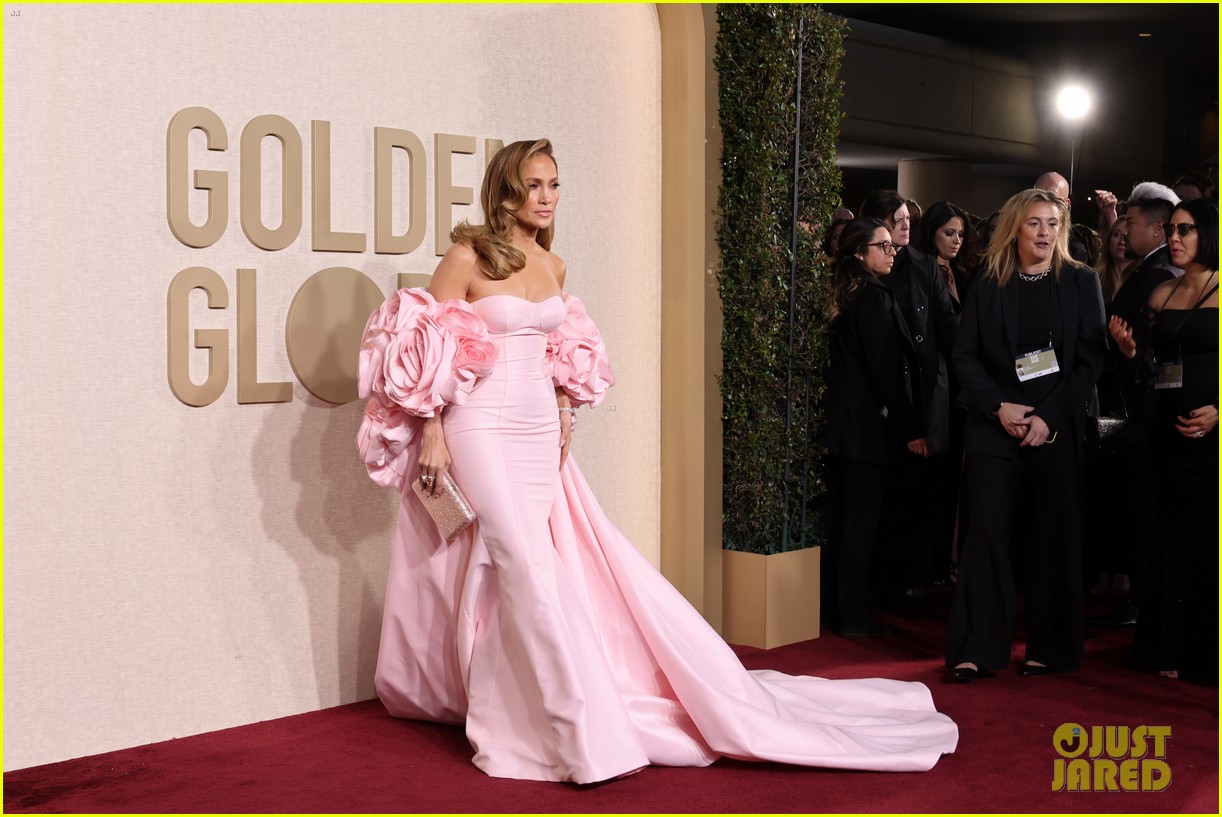jennifer lopez golden globes pink dress Jennifer Lopez Flaunts Toned Abs in Sheer Gown at the 2026 Golden Globes