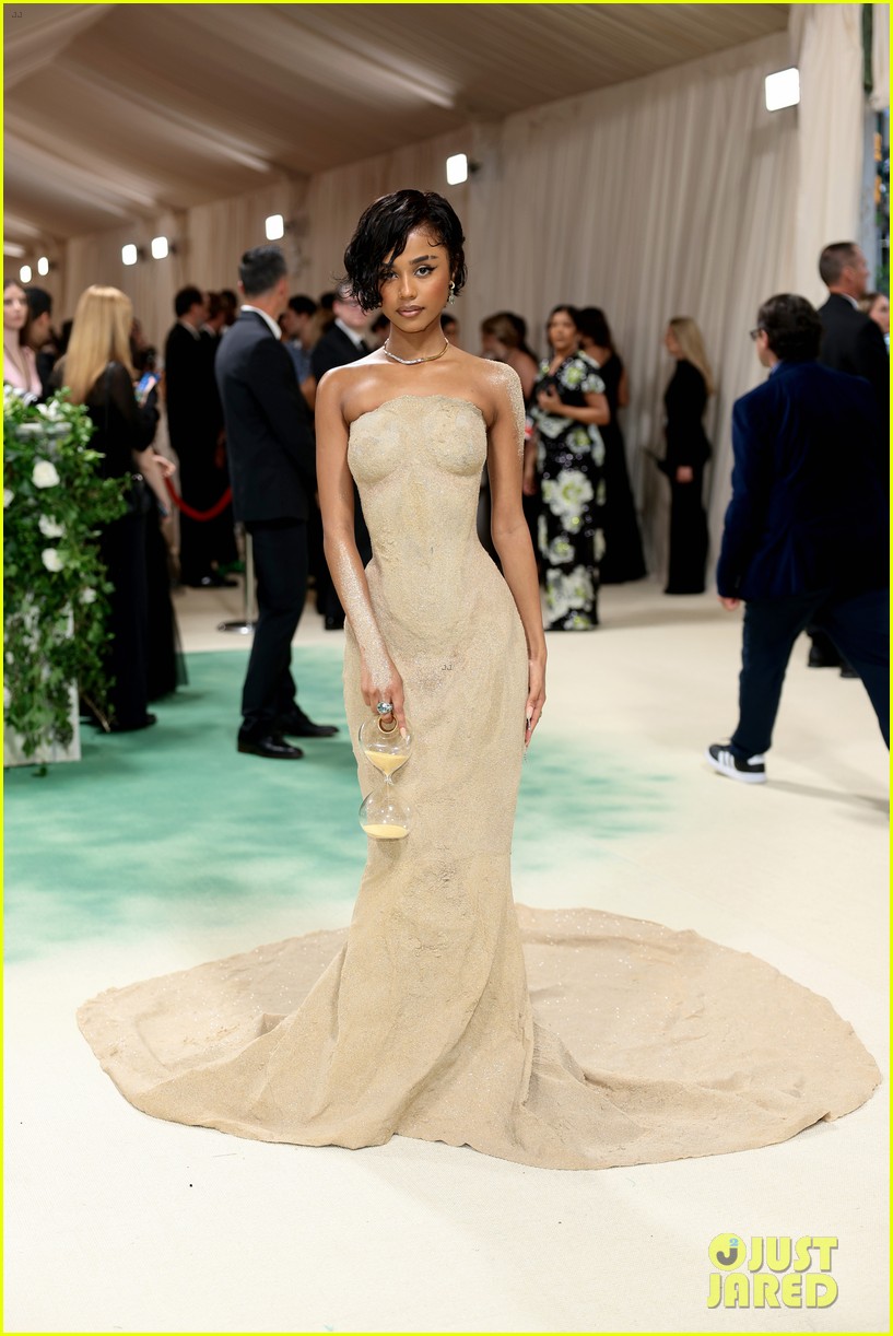 tyla cutting dress Tyla's 2024 Met Gala 'Sand Dress' Gets Cut Off at Bottom