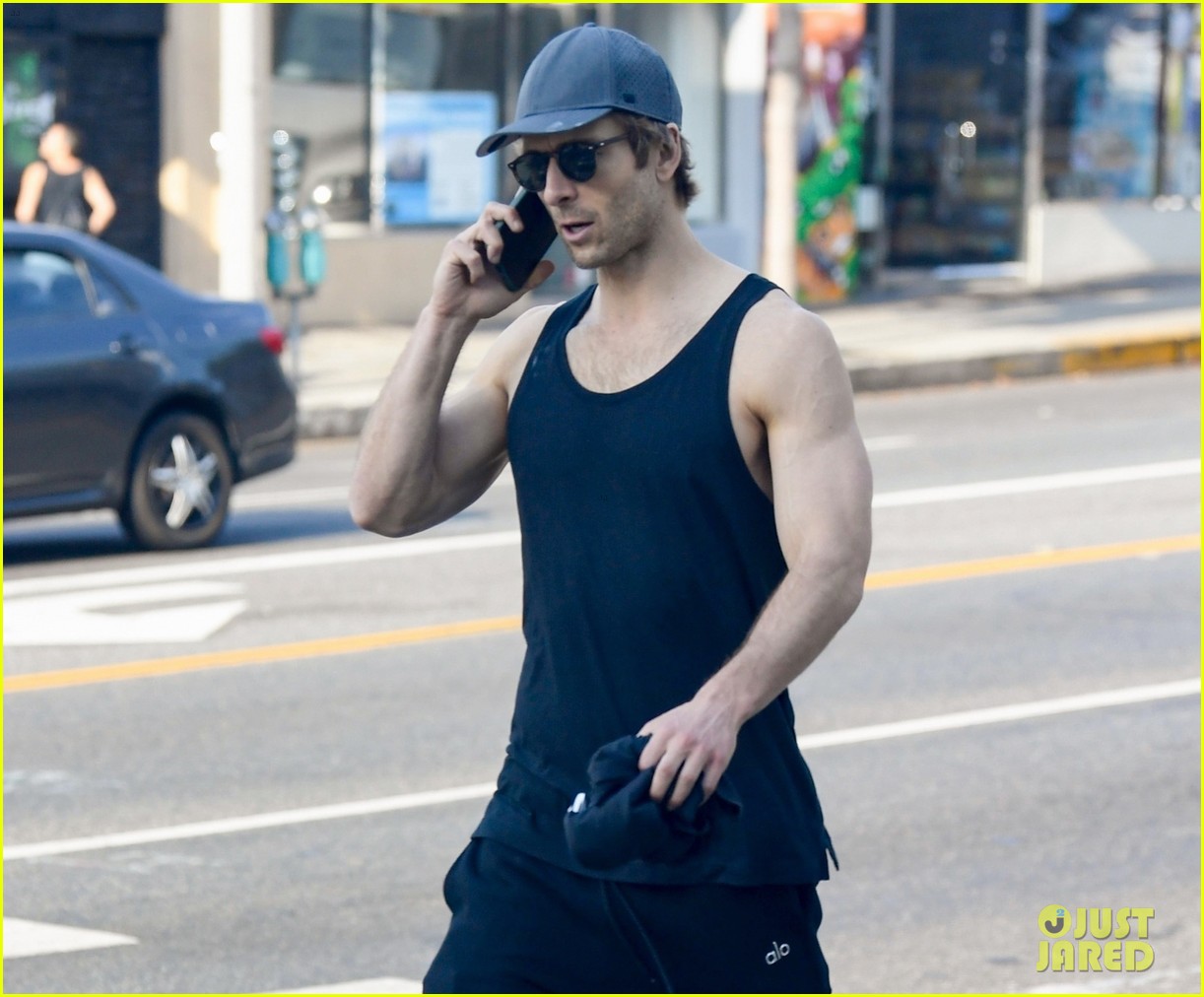 Glen Powell Bares Muscles in a Tank Top in New Post-Gym Photos