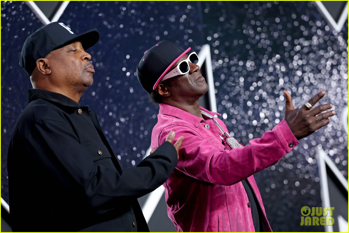 Flavor Flav Gives Jordan Chiles Her Bronze Clock on VMAs Stage, Promises to Give Her Prize Money After Medal Was Taken Away