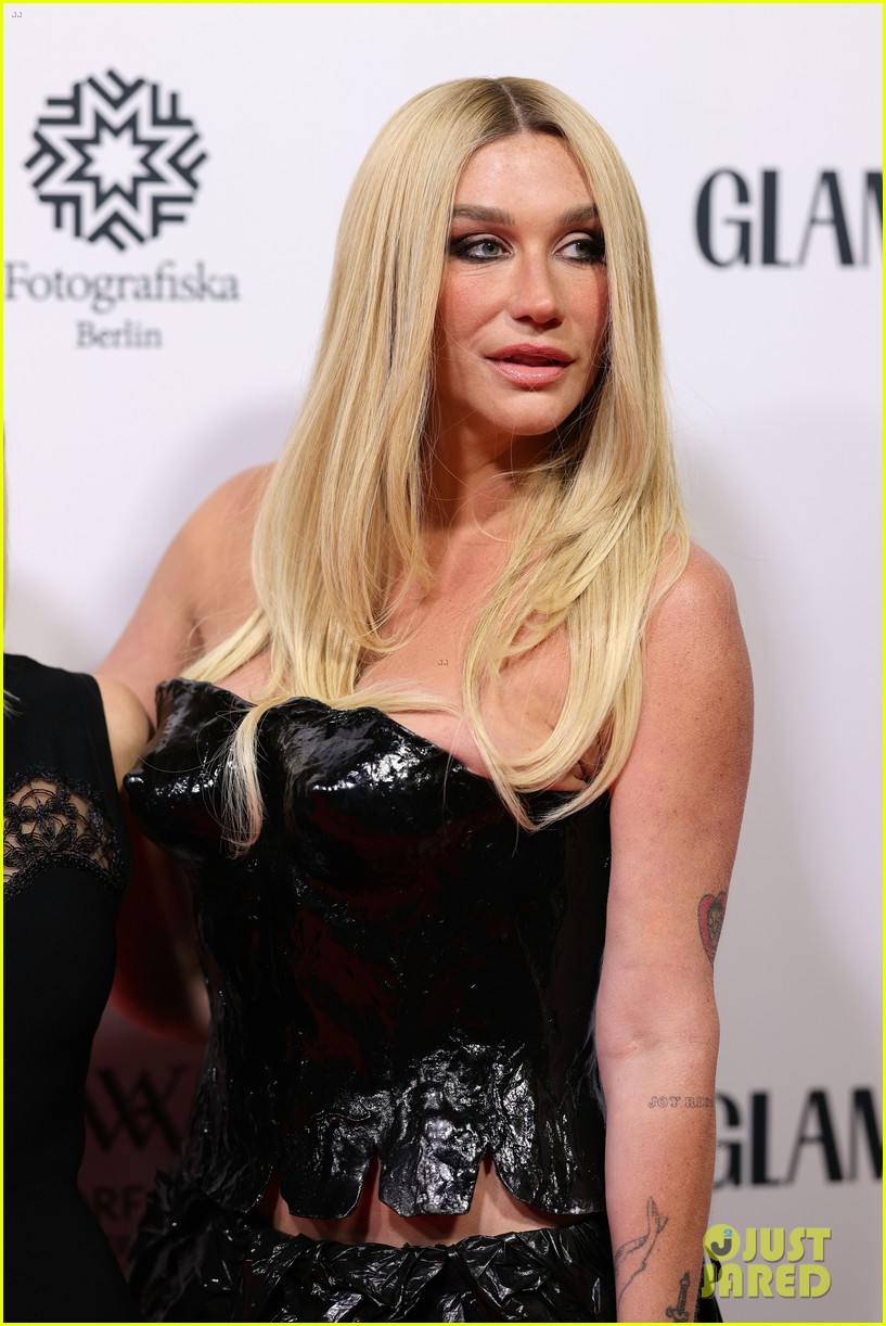 Kesha Vapes on Red Carpet While Wearing Daring Dress at Glamour Event in Berlin