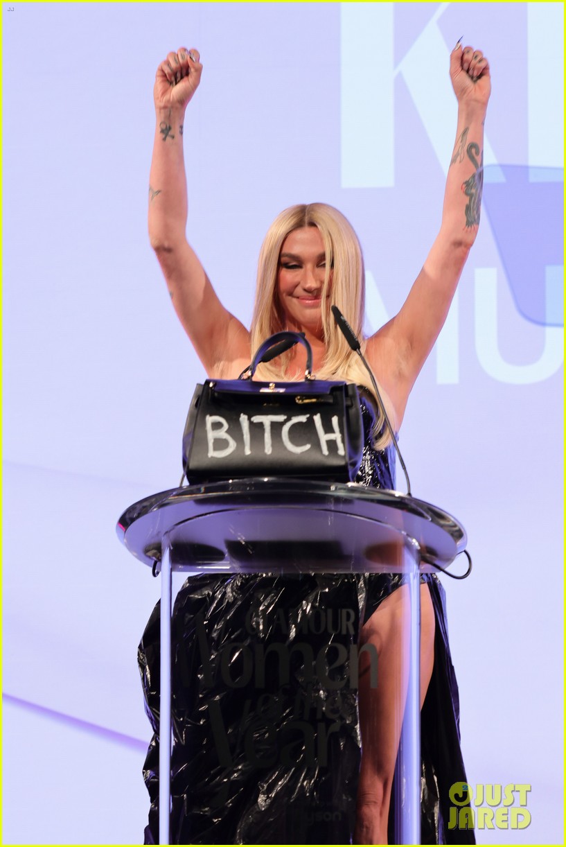Kesha Vapes on Red Carpet While Wearing Daring Dress at Glamour Event in Berlin