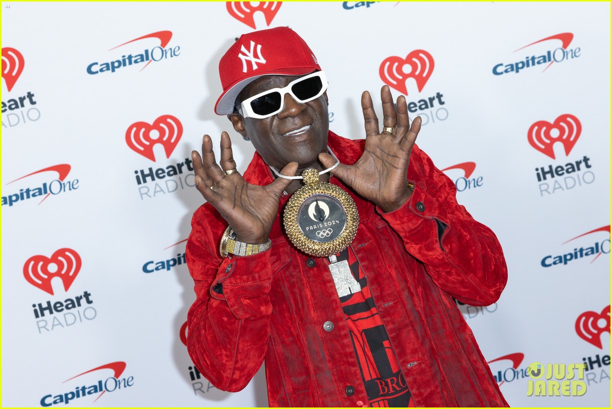 Flavor Flav Tears Up While Receiving Custom Clock from Water Polo Team at Jingle Ball 2024 (Video)