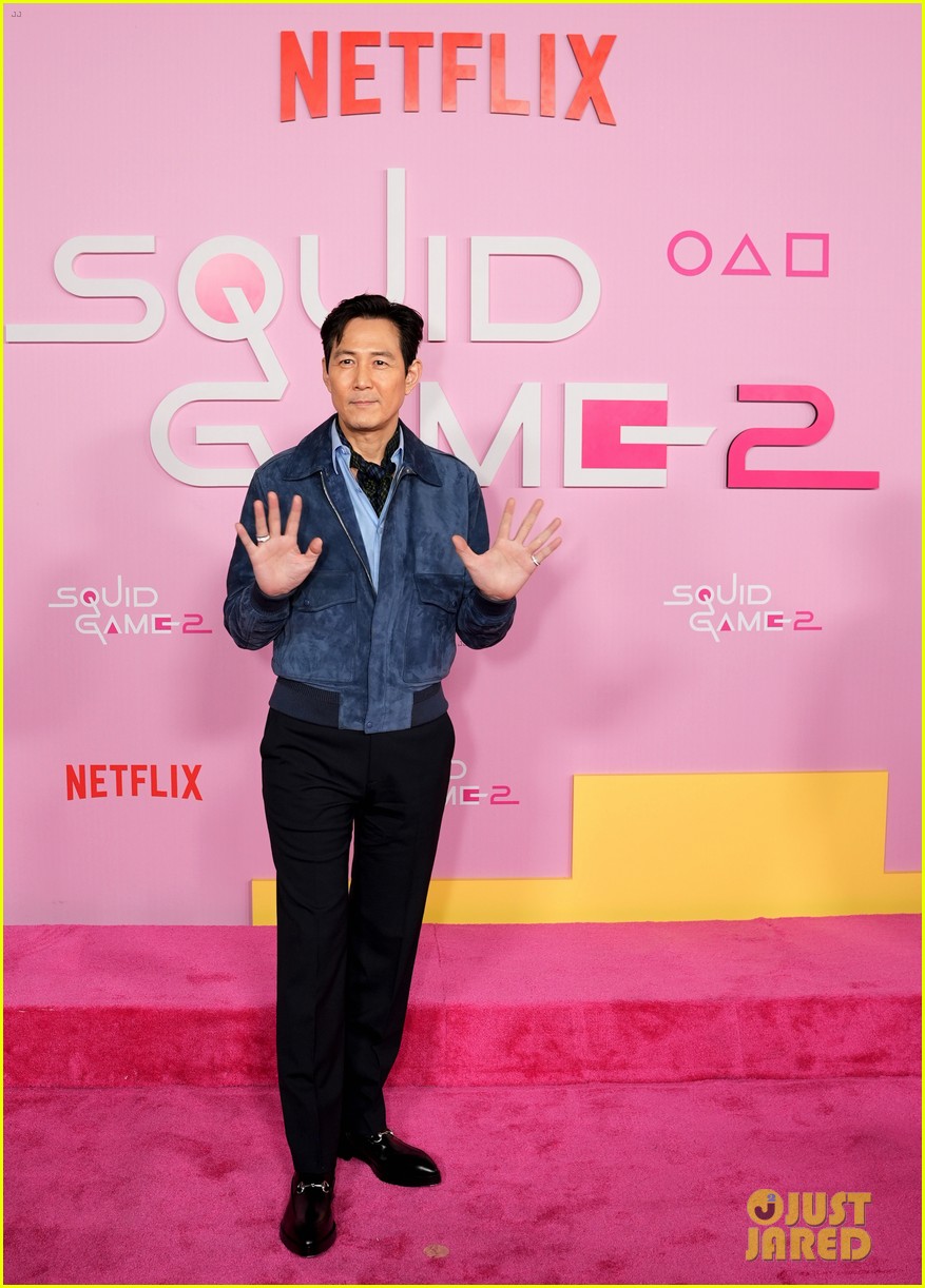 Lee Jung-jae Snaps Group Selfie With 'Squid Game' Co-Stars at Season 2 LA Premiere, Teases 'Many Twists & Turns'