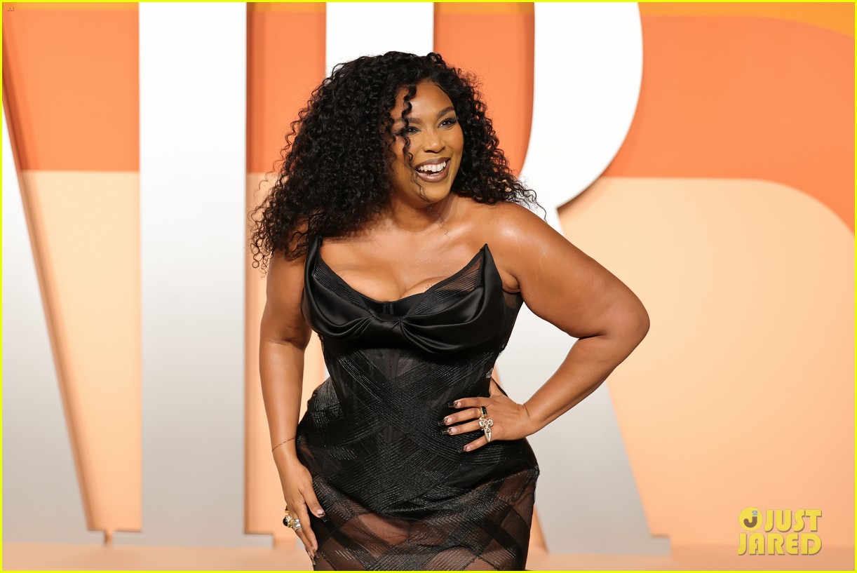 Lizzo Shows Off Svelte Figure Alongside Boyfriend Myke Wright at Vanity Fair Oscars Party