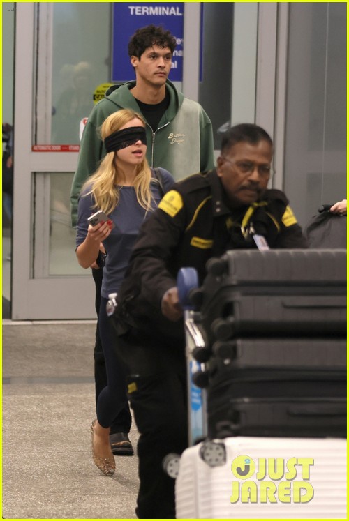 Addison Rae Wears Blindfold at LAX Airport With Basketball Player Addison Owen
