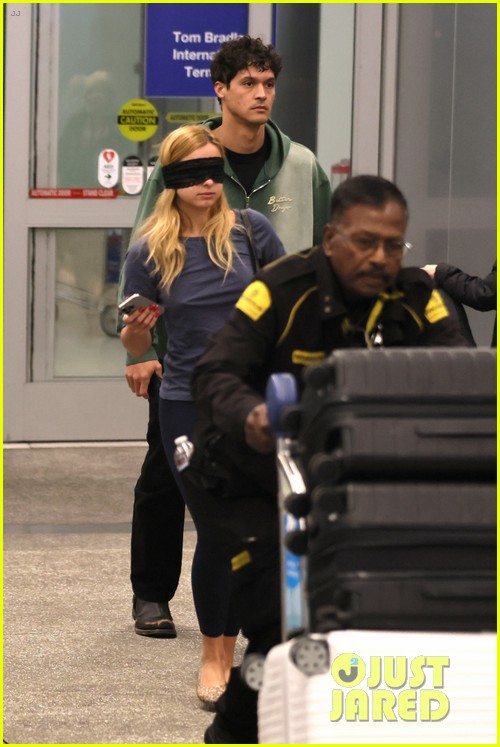 Addison Rae Wears Blindfold at LAX Airport With Basketball Player Addison Owen