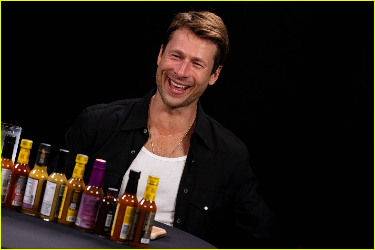 Glen Powell Reveals Which Muscles Sylvester Stallone Told Him to Work On & Who He Bombed a Script Read in Front Of During 'Hot Ones' Appearance