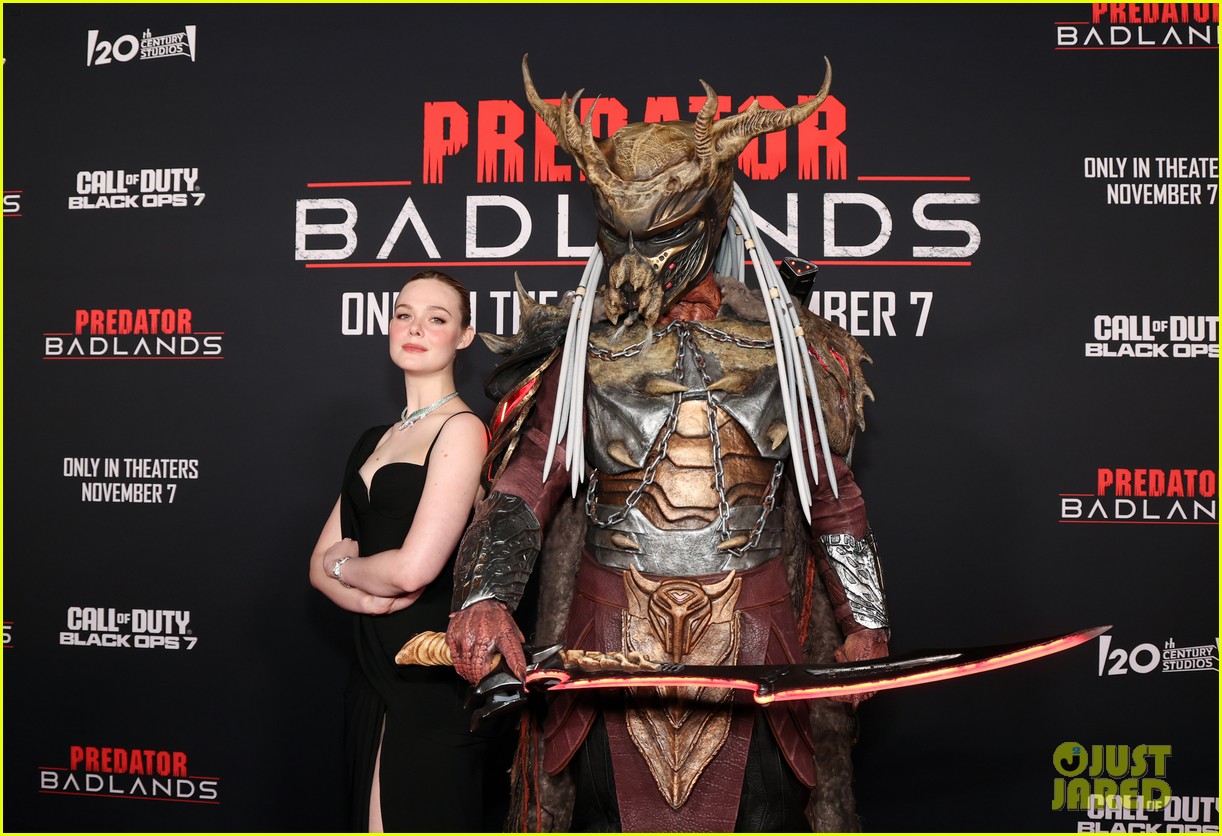 Elle Fanning Poses With an Apex Predator at 'Predator: Badlands' Premiere in Los Angeles