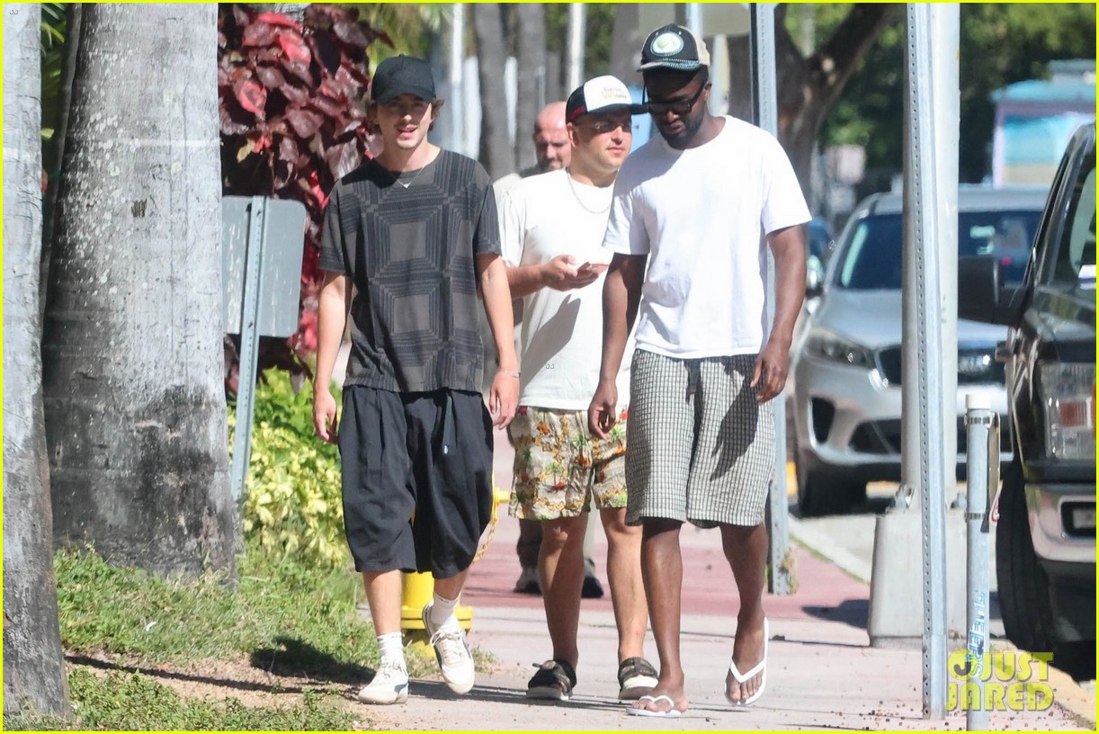 Timothée Chalamet Smiles During Casual Stroll in Miami With Friends
